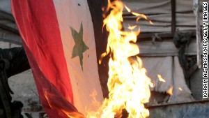 131127130806-syria-flag-fire-story-body.jpg