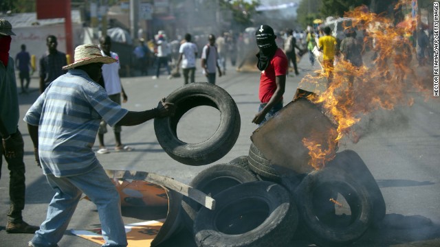 141214102100-haiti-protests-story-top.jpg