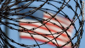 131217194822-u-s-flag-barbed-wire-story-body.jpg