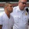 130626181755-hernandez-in-cuffs-topics.jpg