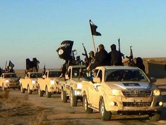 635918323828381860-AP-Mideast-Islamic-State-Budget-Crunch.jpg