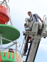 636063224992624698-AP-Ferris-Wheel-Fall.jpg