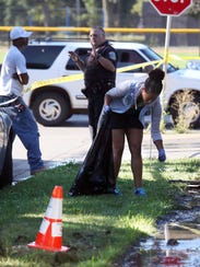 636068566309685438-081416milwaukee-cleanup3.jpg