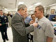 635739395048993451-Casimir-presented-purple-heart-from-G.-W.-Bush.jpg