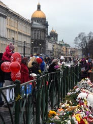 635822338327835789-METROJET-MOURNERS.JPG