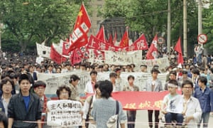 Demonstrators march in Shanghai, 19 May 1989.