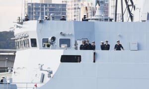 Sailors on board one of the three Chinese naval ships that arrived at Garden Island Naval Base in Sydney on Monday