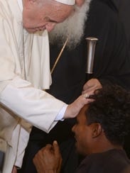 635963921888263019-AP-Pope-Migrants.jpg